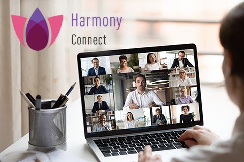 Логотип Harmony Connect и совещание в zoom на ноутбуке